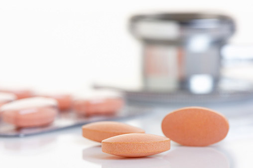 Close up of orange pills